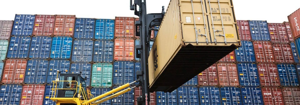 Shipping containers stacked in a depot yard